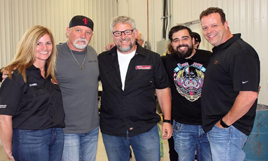 A few of the people at the demonstration held at Wallace's Conley Collision. From left: Donna Rioux, Manager of Peterborough Paint & Body Supply, House of Kolor's Market Manager Ron Fleenor, Darrin Heise and Dave Pereira of PBE Distributors and Chuck Rollins of Valspar. (Photo: Collision Repair magazine)