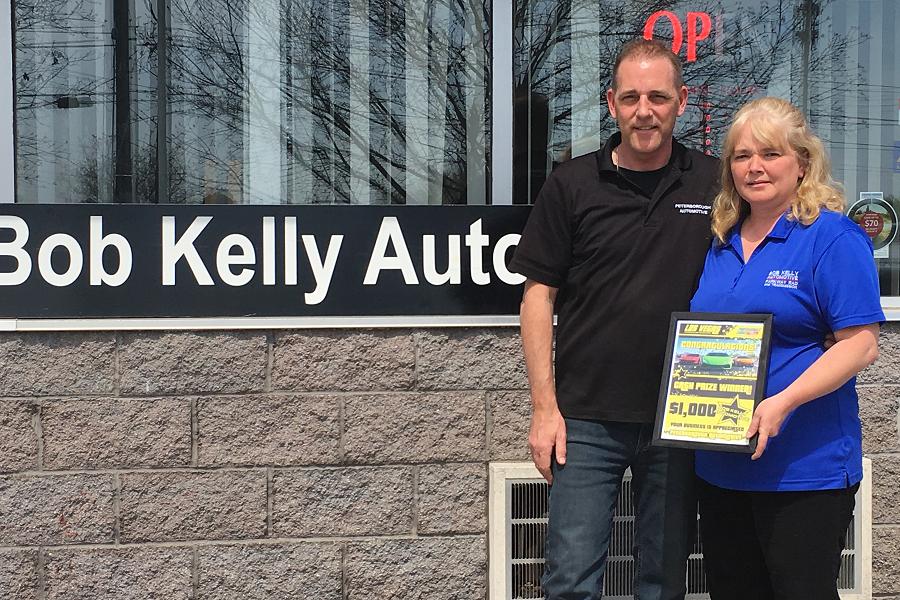 Ormaline Francis, owner and operator of Bob Kelly Automotive in Peterborough, was presented with her $1,000 prize by Jamie Thain, VP of Sales at Peterborough Automotive.